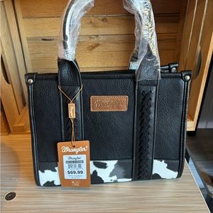 Black conceal carry wrangler cow print bag by Montana west small tote
